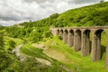 Oblique view of a disused railway viaduct in Smardale. Royalty Free Stock Photo