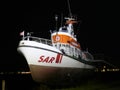 Sea rescue ship SAR in Burg on Fehmarn Germany at night Royalty Free Stock Photo