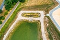 Obliquely aerially taken in front basin or stilling basin of a rainwater retention basin in a new development area Royalty Free Stock Photo