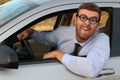 Obnoxious driver with very thick eyeglasses Royalty Free Stock Photo