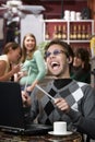 Obnoxious young man singing loudly Royalty Free Stock Photo