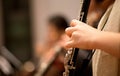 Oboe player performing in an orchestra