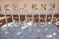 Obscure Bicycle Rack with Colored Tiles in Background