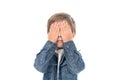 obscured view of little boy covering eyes with hands