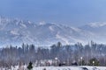 Observation deck in Park of First President, Almaty, Kazakhstan. Mountains of Trans-Ili Alatau Royalty Free Stock Photo