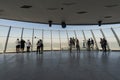 observation deck at the top of a skyscraper on the roof. View of the artificial Palm Jumeirah island. visitors enjoy the