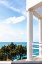 Observation deck with white colonnade on the coast