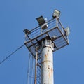 The Observation Floodlight Platform Is Installed On a Pole. The Ladder for Ascent and Descent Is Visible, As Well as The Power