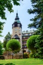 The observation tower of the Spa House of Swieradow Zdroj, view from the green park on a summer sunny day Royalty Free Stock Photo