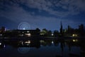 Reflection of the Ferris wheel in the lake