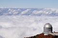 Observatory with a sea of clouds Royalty Free Stock Photo