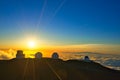 The observatory in a sea of sunset clouds. Royalty Free Stock Photo