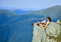 Observing point. Woman military outfit hold weapon highlands background. Brave girl dangerous situation. Military female Royalty Free Stock Photo