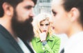 Obsessed ex girlfriend spying to a couple dating. She is obviously jealous. Bearded man cheating his girlfriend with Royalty Free Stock Photo