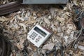 Obsolete calculator in junkyard