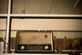 Obsolete radio in wooden case. Horizontal indoors