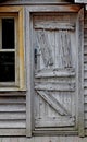 Obsolete wooden door of very old house