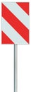 Obstacle detour barrier road sign on pole post, red, white diagonal striped vertical traffic safety warning signage large closeup