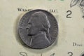 Obverse side of American money coin of 5 five cents 1964 features the profile of Thomas Jefferson the founding father and 3rd Royalty Free Stock Photo