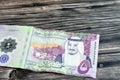 Obverse side of the new polymer 5 SAR five Saudi Arabia riyals cash money banknote bill series 1441 AH features Shaybah oil