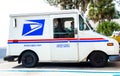 Ocala, Florida, USA November 2, 2023 USPS truck delivering mail on suburban street parked in occupied space. red white and blue Royalty Free Stock Photo