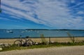 Ocean bay with boats, beach and bicycle on a summer day in Maine Royalty Free Stock Photo