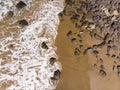 Ocean beach, sand, waves and stones. Photo texture for design