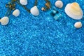 Ocean blue background with sea shells, snail, glass bottle Royalty Free Stock Photo