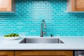 ocean blue subway tiles in a kitchen