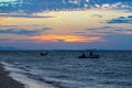 The ocean is blue and two boats in the distance. Sunset. Thailand. Samui. Gulf of Thailand Royalty Free Stock Photo