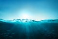 Ocean blue underwater waves with sun beam clear view realistic, world oceans day banner