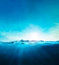 Ocean blue underwater waves with sun beam clear view realistic, world oceans day banner Royalty Free Stock Photo