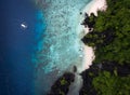 A tour boat drives to an island in El Nido Palawan Philippines Royalty Free Stock Photo