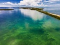 Ocean bridge view over shimmering Florida waters under bright summer sky Royalty Free Stock Photo