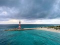 An aerial view of the lighthouse and beach of MSC Cruise Lines private island Ocean Cay, Bahamas Royalty Free Stock Photo