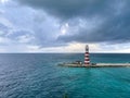 An aerial view of the lighthouse and beach of MSC Cruise Lines private island Ocean Cay, Bahamas Royalty Free Stock Photo