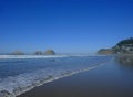 Ocean on a cloudless day with rock formations