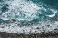 Ocean coast aerial, pebble stone beach and waves Royalty Free Stock Photo