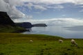 ocean coast at Neist point lighthouse with sheep, Scotland Royalty Free Stock Photo