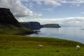 ocean coast at Neist point lighthouse with sheep, Scotland Royalty Free Stock Photo