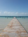 Ocean Dock Isla Mujeres Cancun Quintana Roo Mexico blue water sky wooden travel tourism Royalty Free Stock Photo