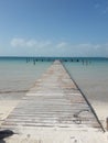 Ocean Dock Isla Mujeres Cancun Quintana Roo Mexico blue water sky wooden travel tourism Royalty Free Stock Photo
