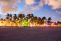 Ocean Drive Miami Beach at sunset. City skyline with palm trees at dusk. Art deco on the South beach Royalty Free Stock Photo