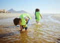 Ocean, environment and young child cleaning for climate change and sustainability, environmental and volunteer for Earth Royalty Free Stock Photo