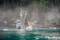 Ocean fishing boat set up the net for salmon in Alaska bay. Royalty Free Stock Photo