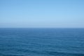 Ocean horizon - clear blue sky background