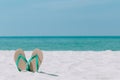 Ocean landscape And sandals on the beach. Welcome summer