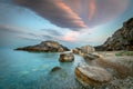 Ocean Landsckape. Sunset. Sea. Evening time on the sea shore. Big rocks and colorful dramatic clouds. Beautiful landscape Royalty Free Stock Photo