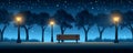 The ocean is lined with a park bench under palm trees in a peaceful night scene Royalty Free Stock Photo