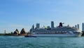 The ocean liner Carnival Splendor cruises out of Sydney Harbor